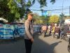 Pelayanan Prima di Jam Sibuk, Kapolsek Tamalanrea Bersama Personel Pengaturan Arus Lalu Lintas