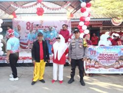 Bhabinkamtibmas Karunrung Pantau Karnaval HUT RI ke-81